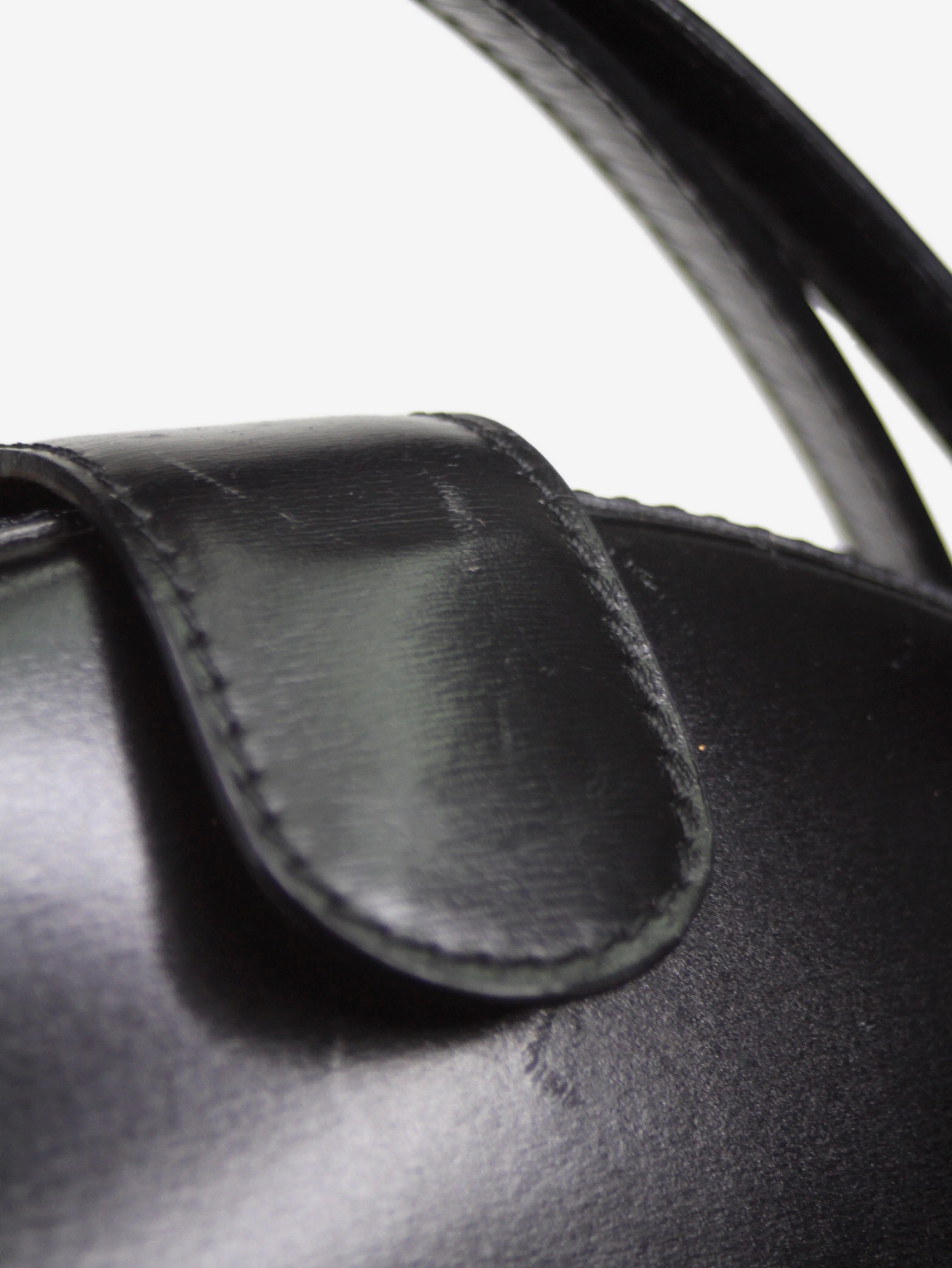 Black vintage circle Anagram bag