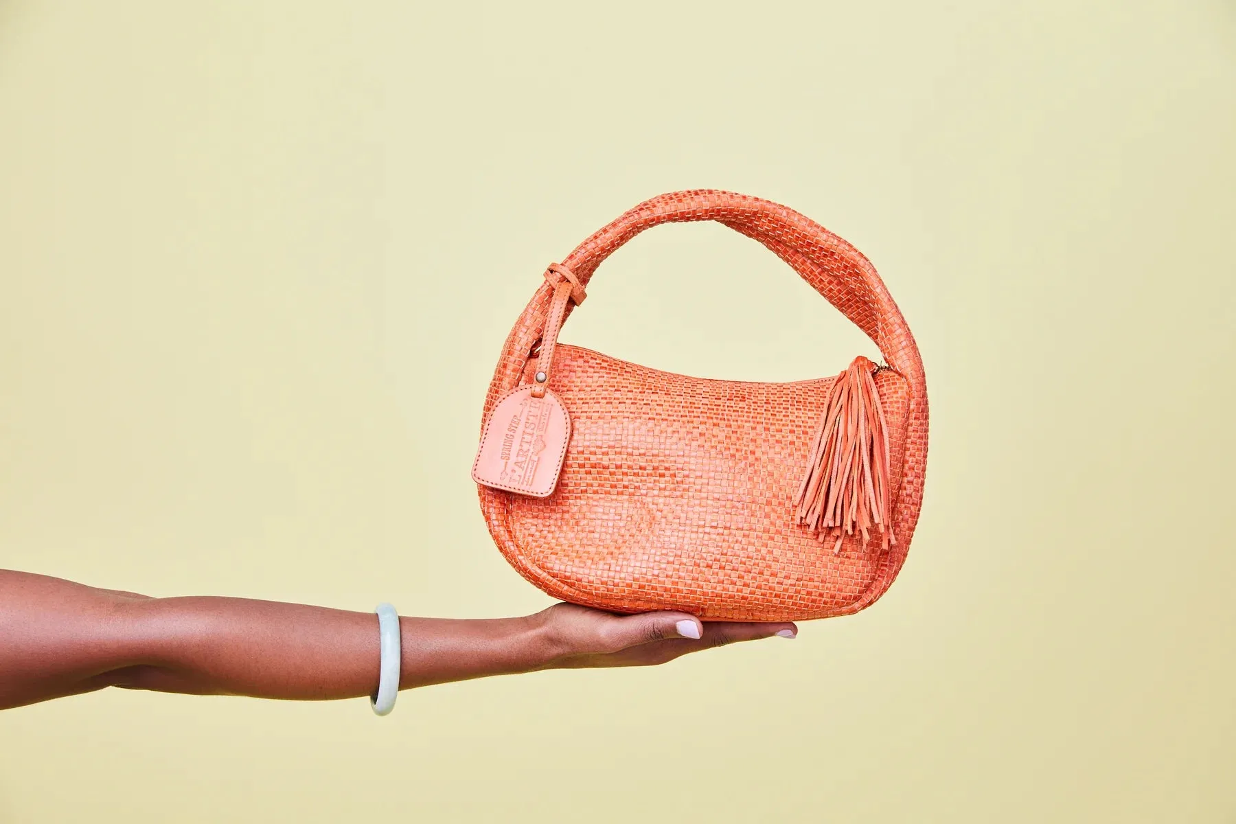 Intricately Woven Handbag in Orange Leather